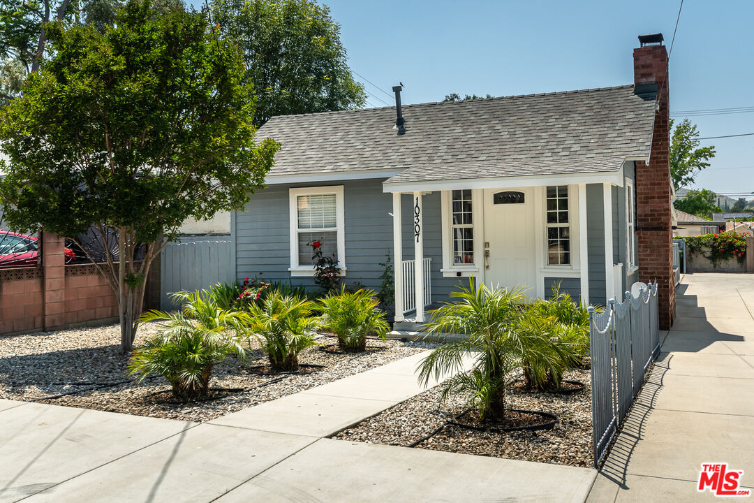 10307 Eldora Avenue Sunland, CA 91040 - Photo 2 of 32 a front view of a house with garden