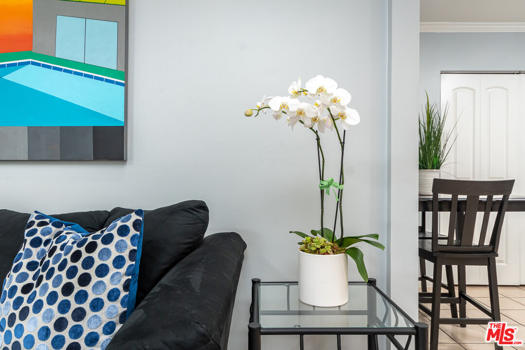10307 Eldora Avenue Sunland, CA 91040 - Photo 10 of 32 a dining room with furniture and a potted plant