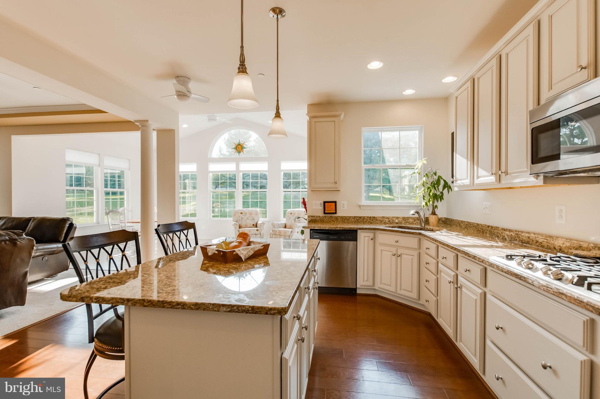 4117 Sweet Air Road Baldwin, MD 21013 - Photo 11 of 30 a kitchen with granite countertop a sink and a stove top oven