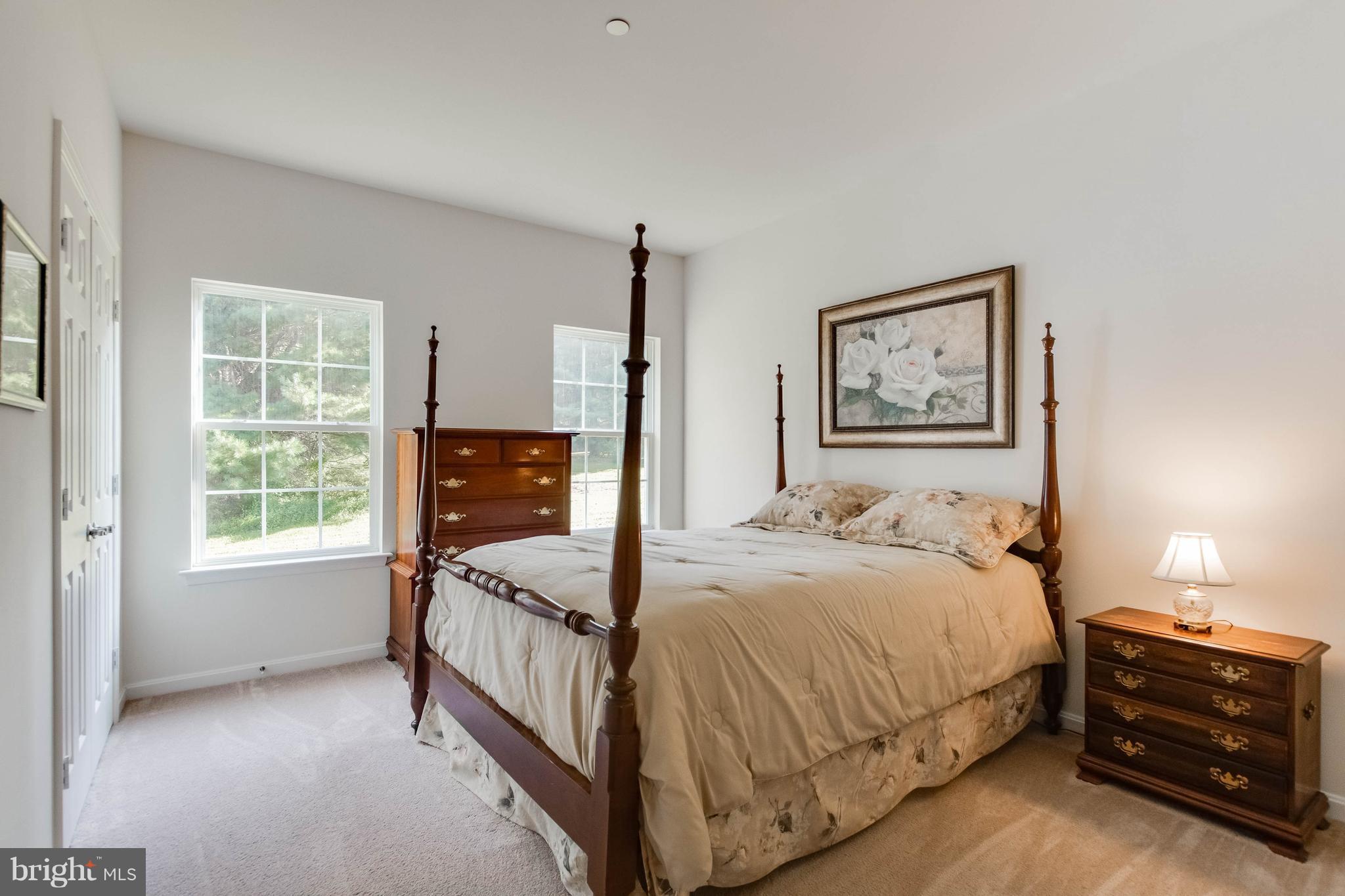 4117 Sweet Air Road Baldwin, MD 21013 - Photo 24 of 30 a bedroom with a bed next to a window