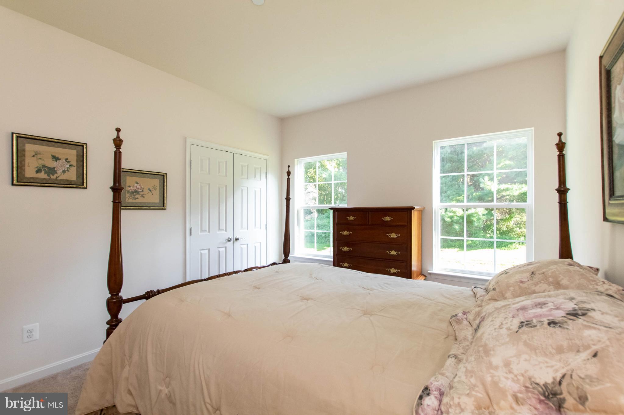 4117 Sweet Air Road Baldwin, MD 21013 - Photo 25 of 30 a large bedroom with a bed and a window