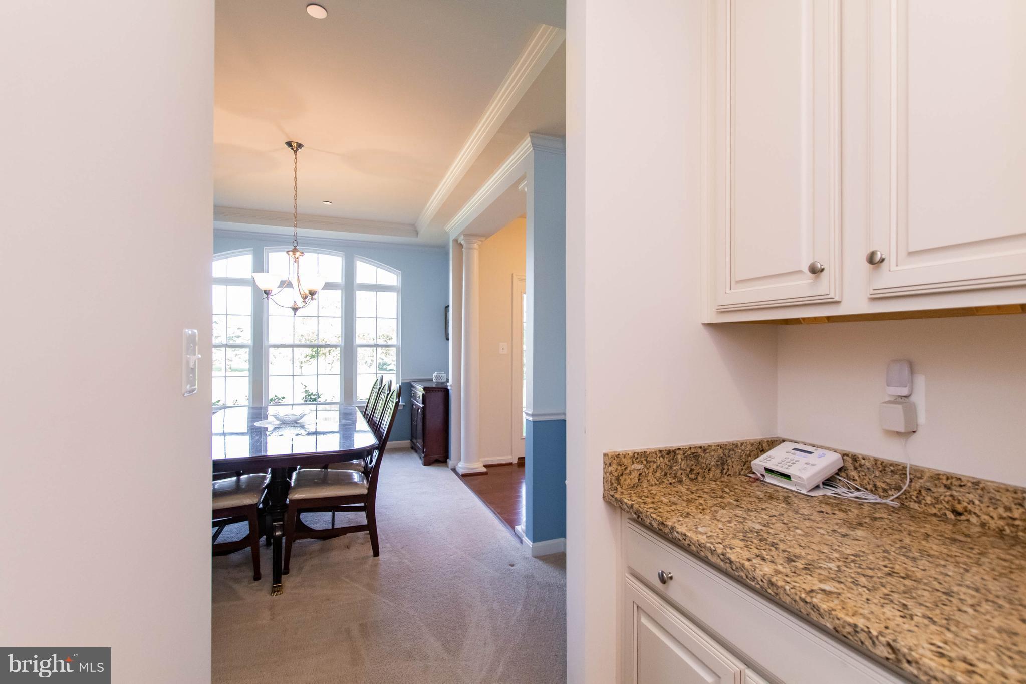 4117 Sweet Air Road Baldwin, MD 21013 - Photo 5 of 30 a kitchen with granite countertop sink and cabinets