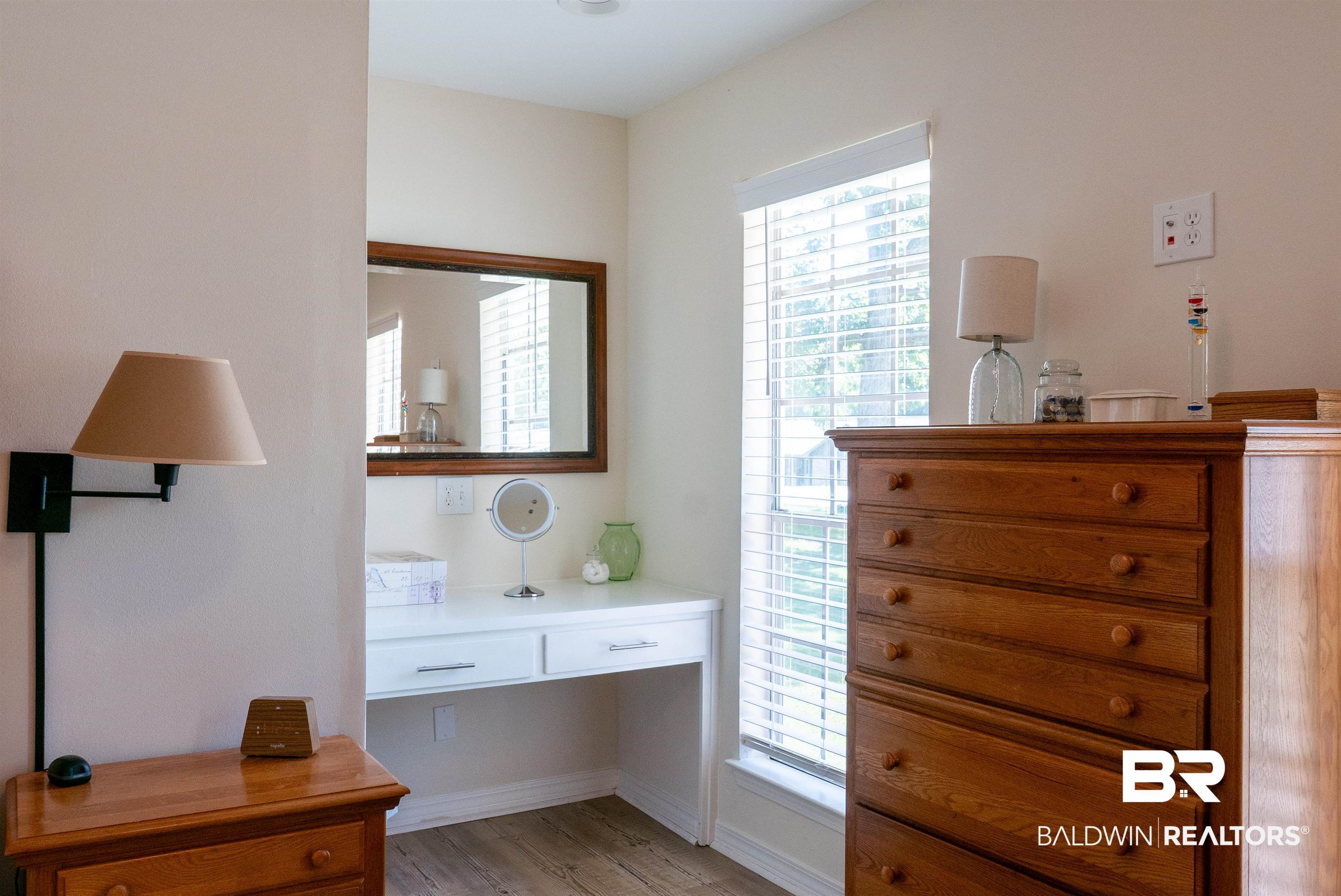 630 Spanish Main Daphne, AL 36527 - Photo 16 of 40 Bedroom featuring multiple windows and light hardwood / wood-style floors