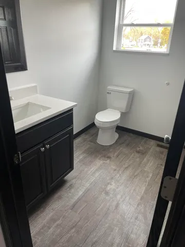 a bathroom with a sink and a toilet