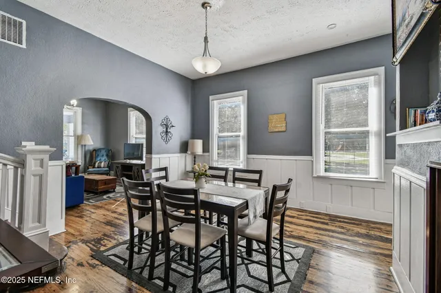 a kitchen with stainless steel appliances a sink stove and refrigerator