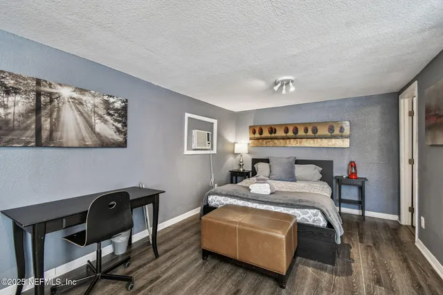 a view of a house with swimming pool and sitting area