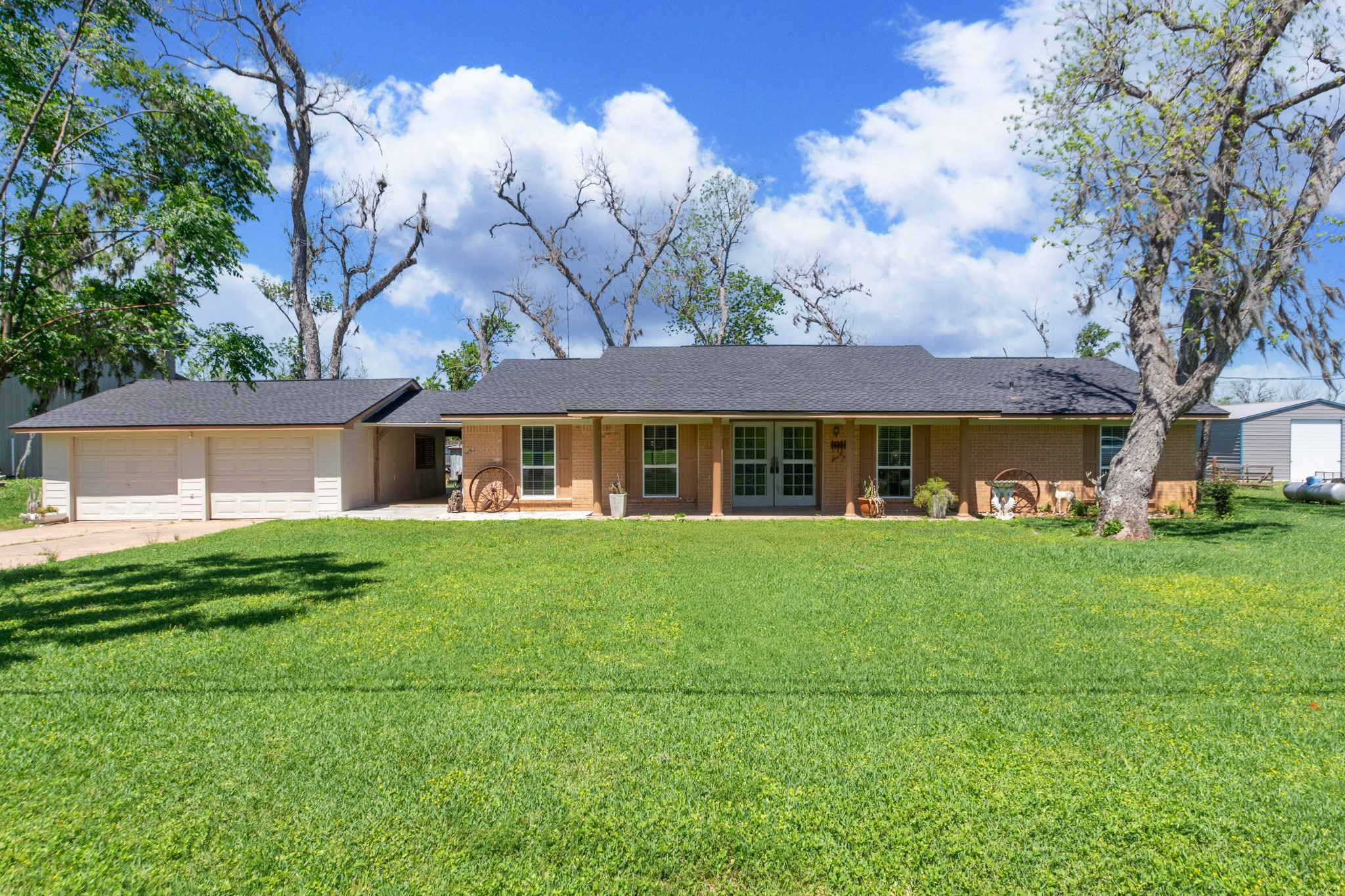 400 Pecan Estates Road, Unit C616R Angleton, TX 77515 - Photo 1 of 49 a view of a yard in front of the house