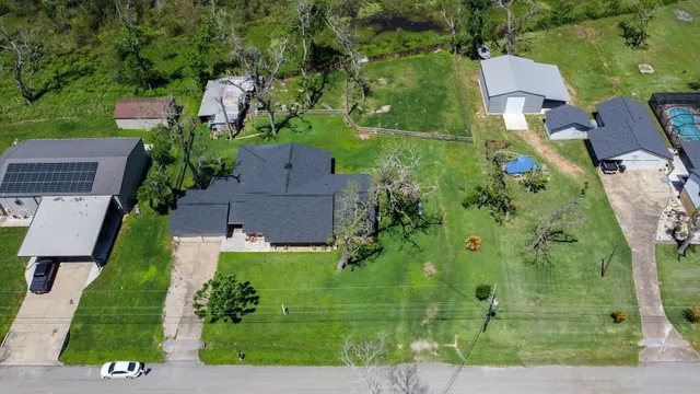 a view of backyard with green space