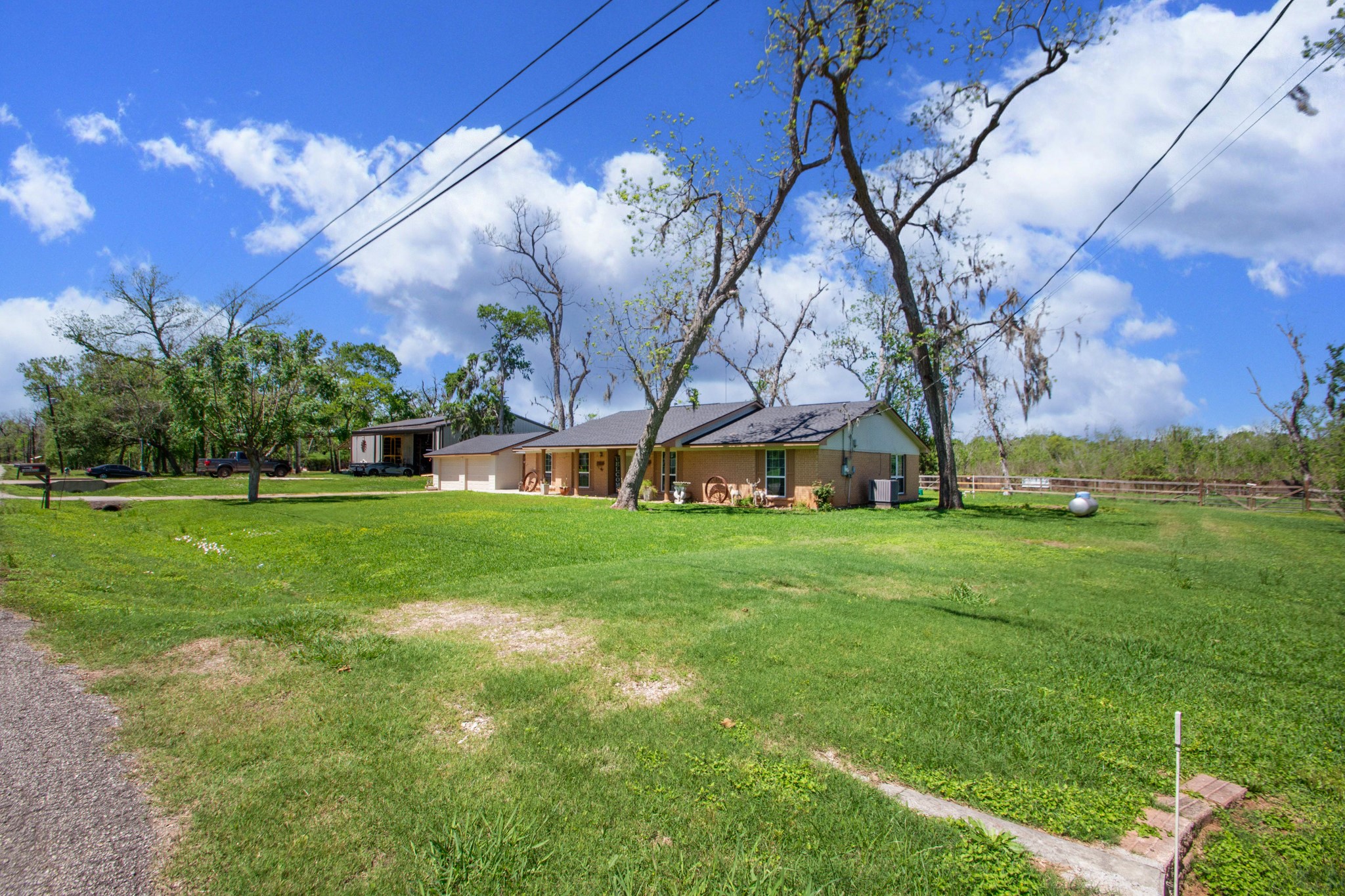400 Pecan Estates Road, Unit C616R Angleton, TX 77515 - Photo 24 of 49 a view of a park with large trees