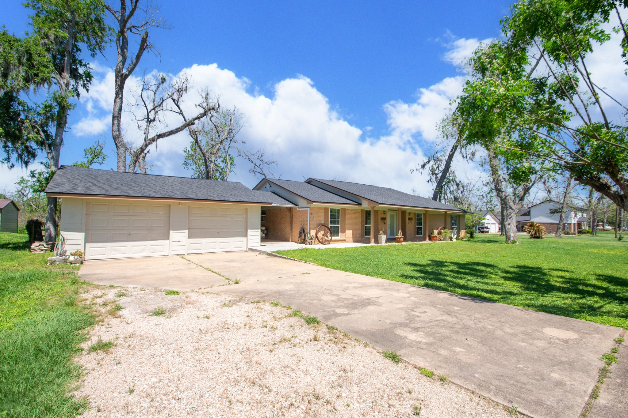 400 Pecan Estates Road, Unit C616R Angleton, TX 77515 - Photo 4 of 49 a front view of a house with a yard and garage