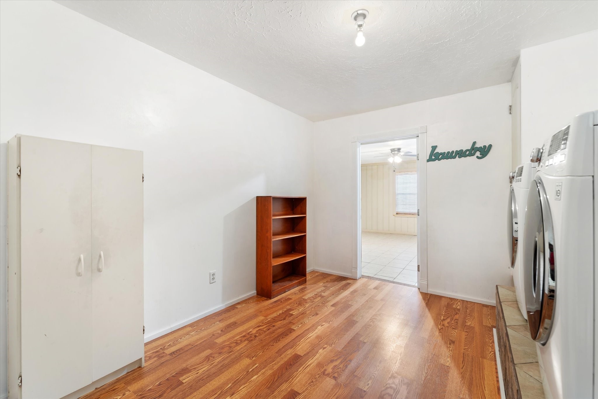 400 Pecan Estates Road, Unit C616R Angleton, TX 77515 - Photo 40 of 49 a view of empty room with wooden floor