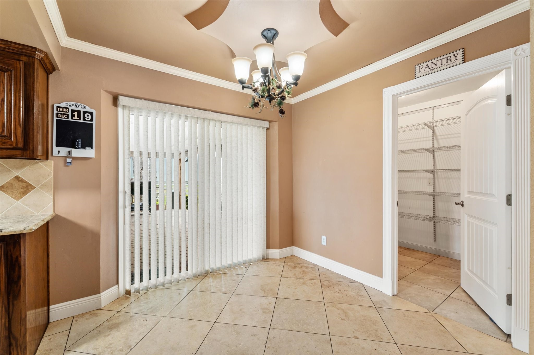 400 Pecan Estates Road, Unit C616R Angleton, TX 77515 - Photo 47 of 49 a view of a hallway with a chandelier