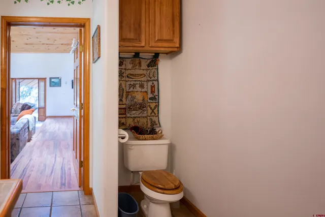 a bathroom with a toilet and a sink