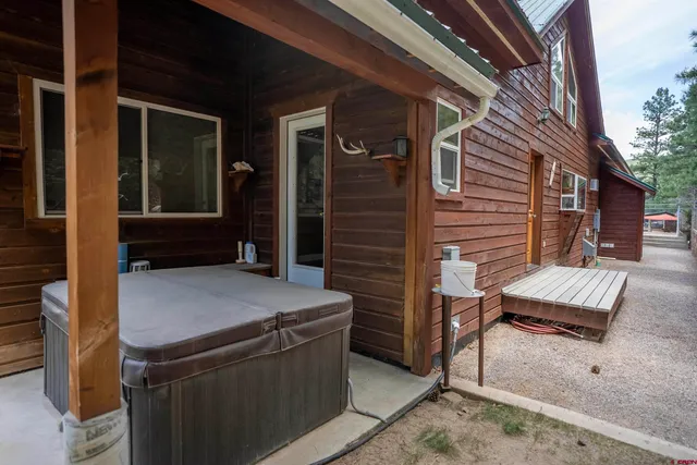 a backyard of a house with seating space