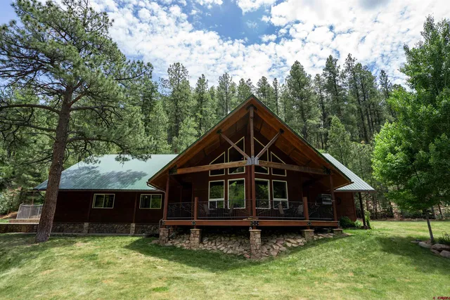 a view of a backyard with tree s