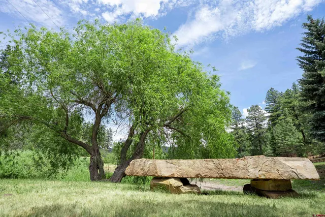 a view of pathway and small yard