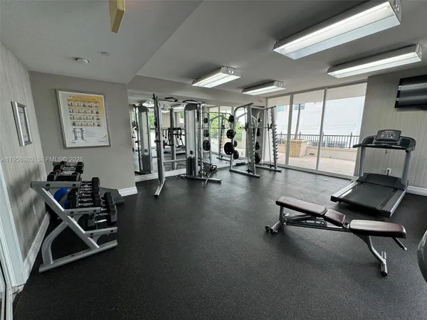 a view of a room with gym equipment