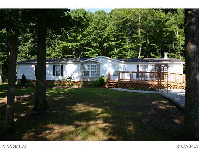3244 Lowry Road Columbia, VA 23038 - Photo 1 of 12 a house view with a garden space