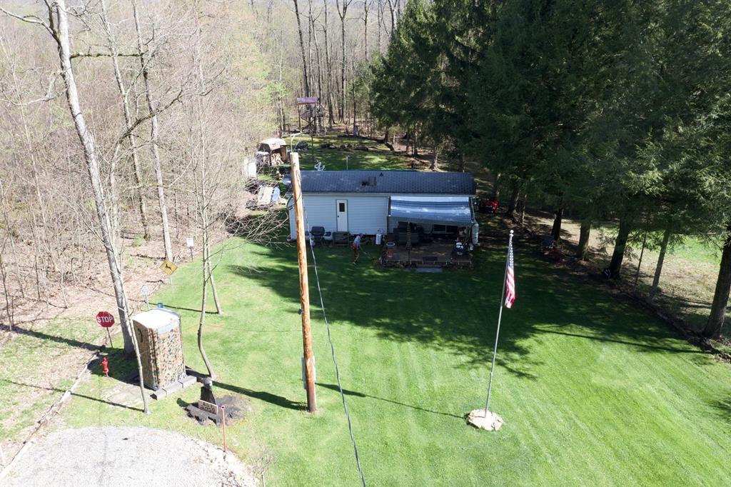481 Twin Oaks Road Polk, PA 16342 - Photo 1 of 23 a view of a yard