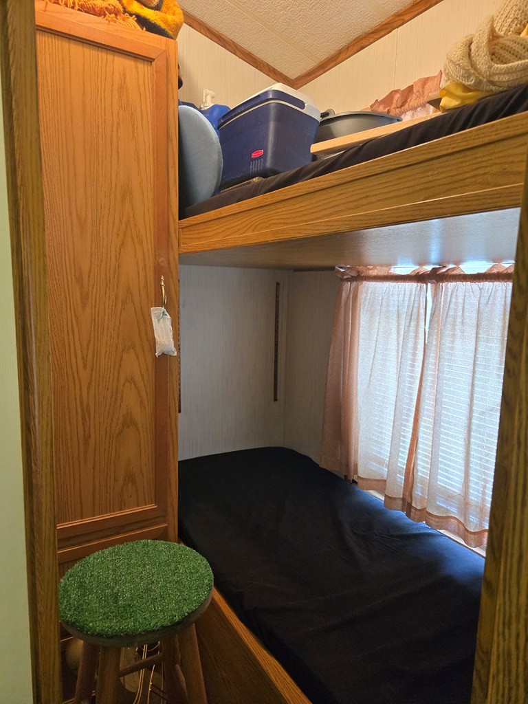 481 Twin Oaks Road Polk, PA 16342 - Photo 14 of 23 a view of a door and chair in the room