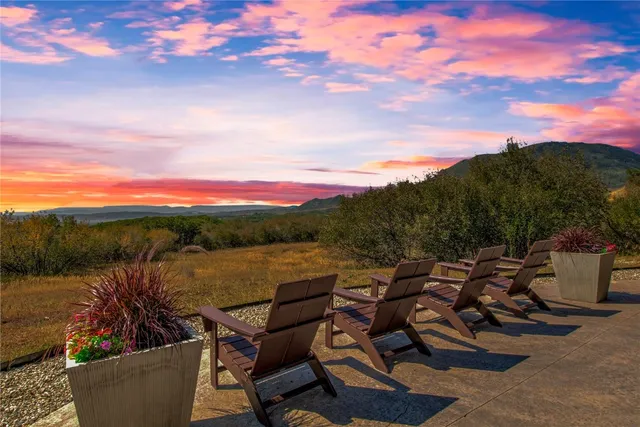 a view of swimming pool from a balcony