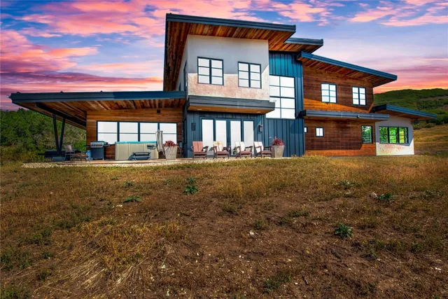 front view of a building with a yard