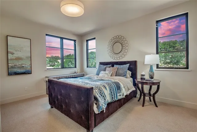 a room with gym equipment and windows