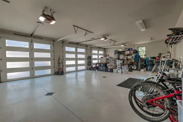 a view of a patio with table and chairs a barbeque with wooden floor and fence