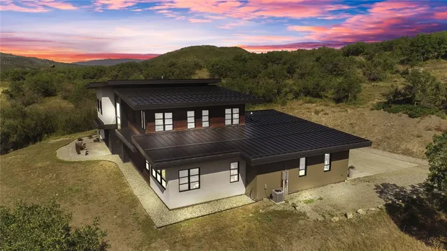 front view of a house with a road