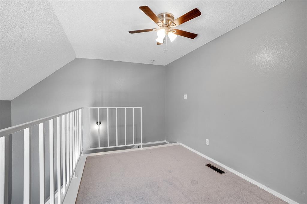 9815 Walnut Street, Unit 214 Dallas, TX 75243 - Photo 21 of 29 a view of an empty room