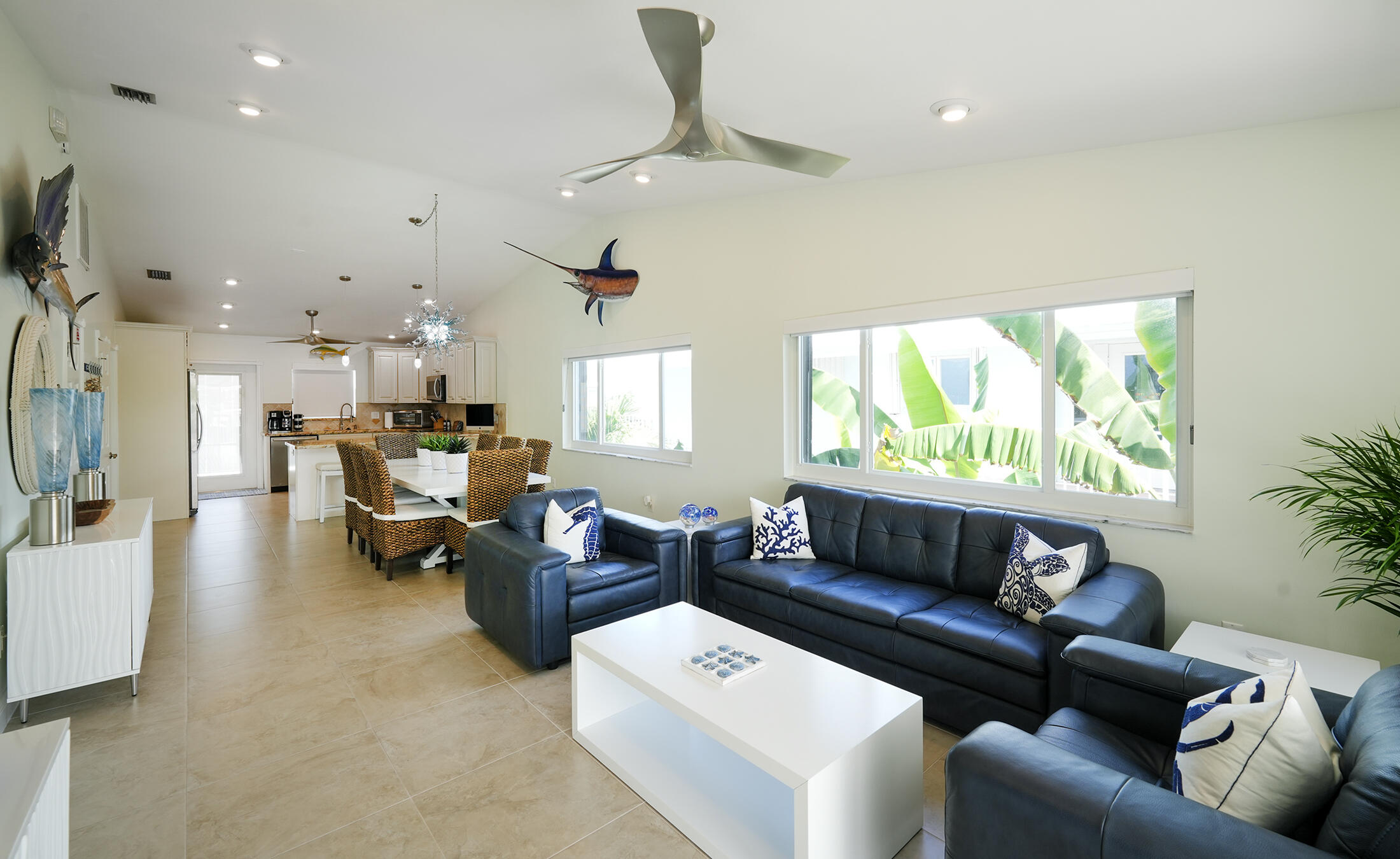 610 9th Street Key Colony Beach, FL 33051 - Photo 14 of 28 a living room with furniture and a large window