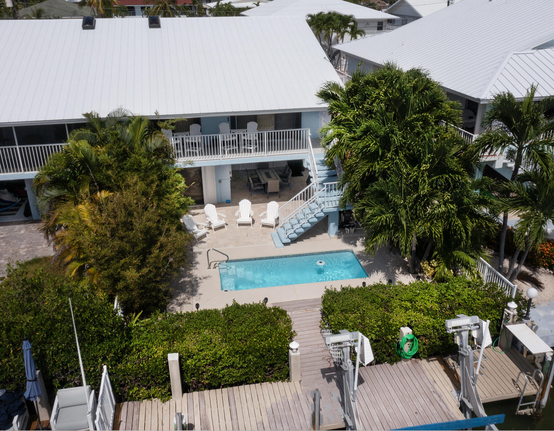 610 9th Street Key Colony Beach, FL 33051 - Photo 2 of 28 an aerial view of a house with garden space and street view