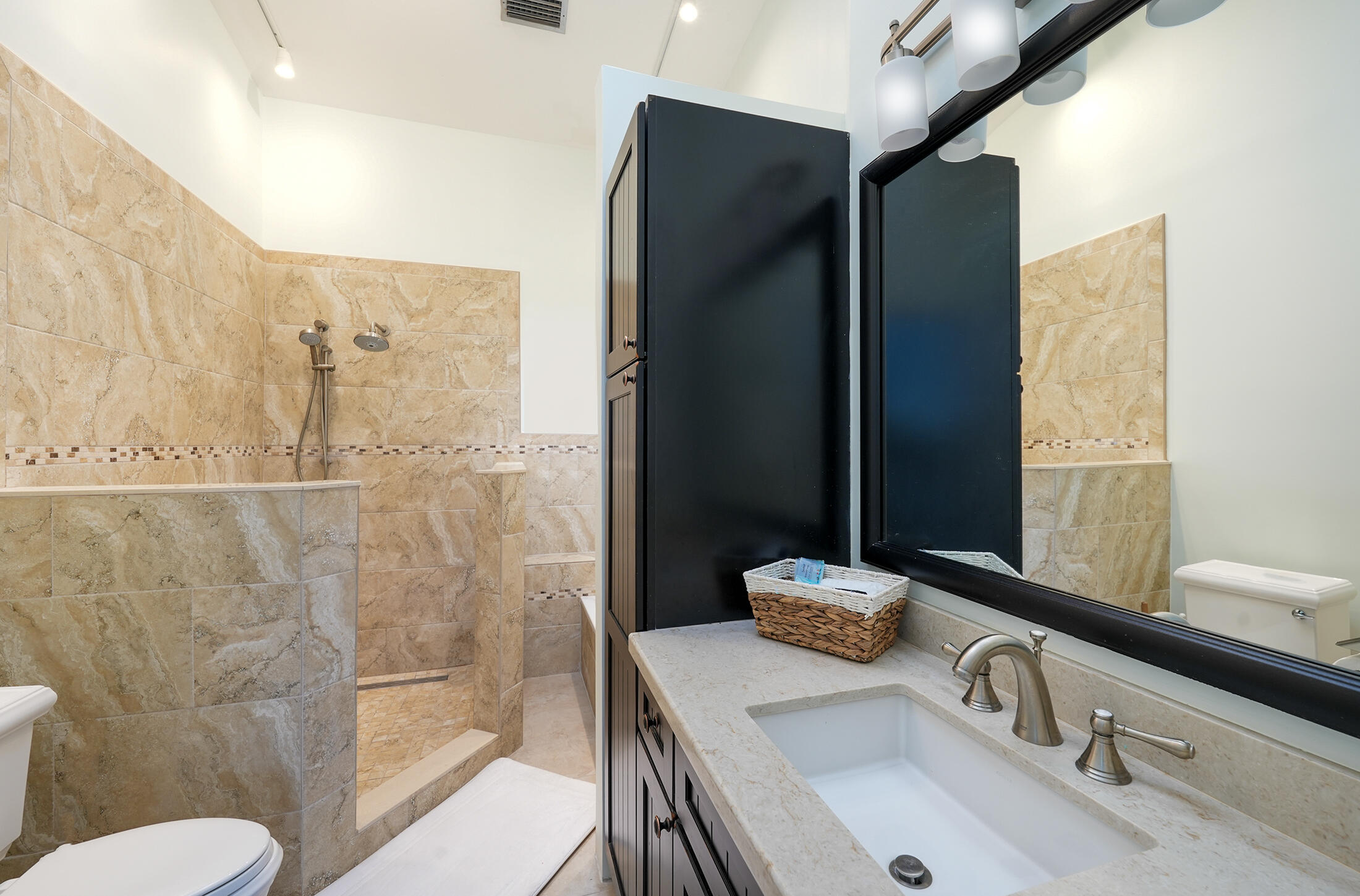 610 9th Street Key Colony Beach, FL 33051 - Photo 20 of 28 a bathroom with a granite countertop sink and a mirror