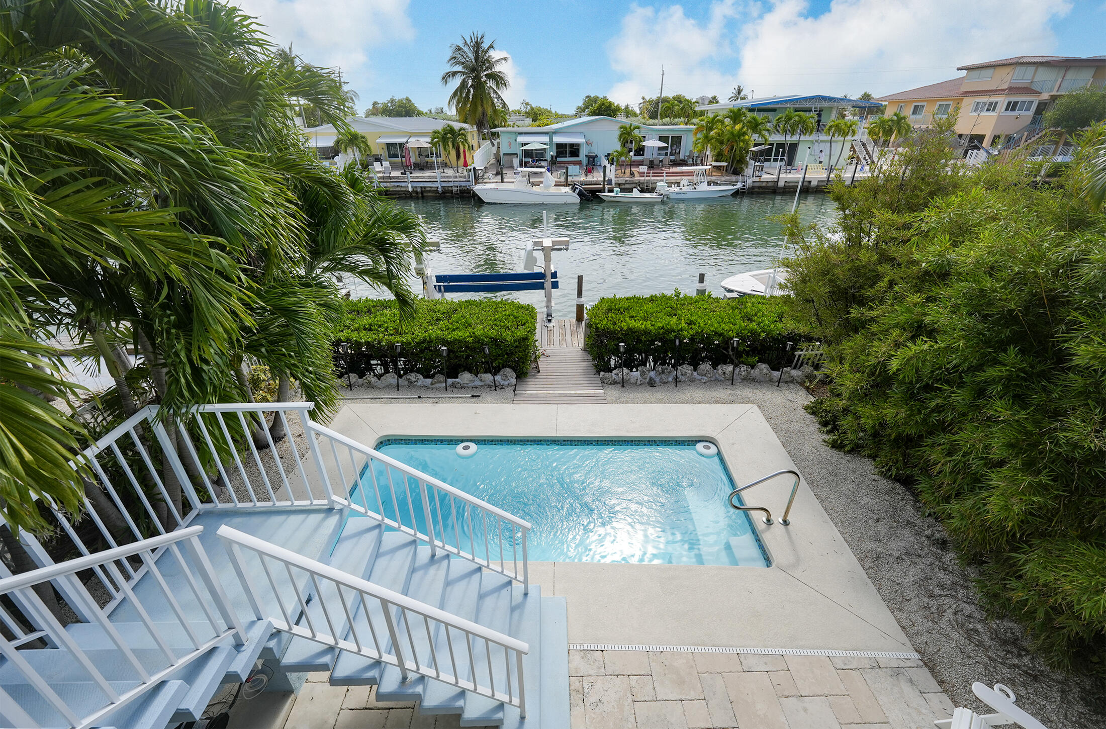 610 9th Street Key Colony Beach, FL 33051 - Photo 5 of 28 a view of swimming pool from a balcony