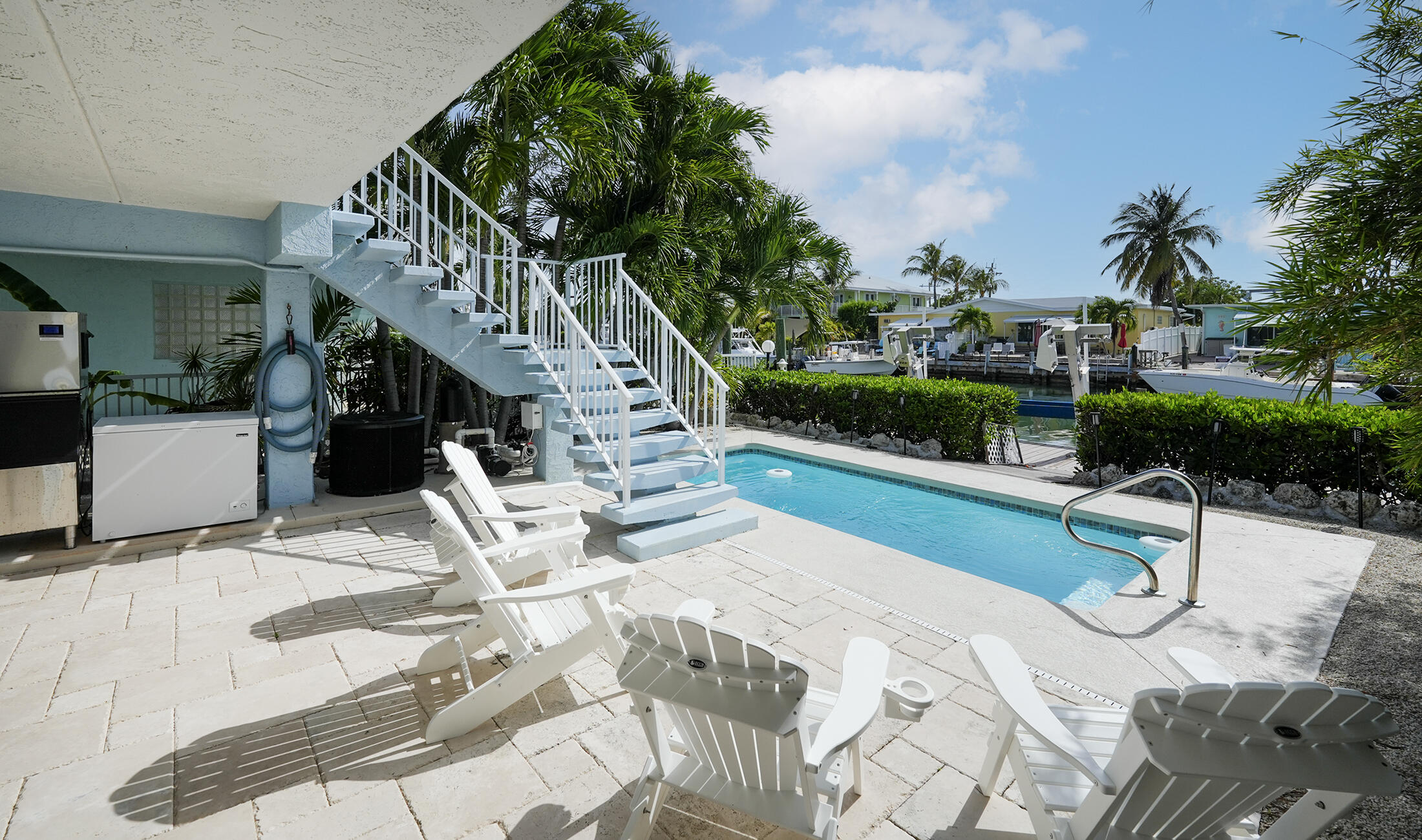 610 9th Street Key Colony Beach, FL 33051 - Photo 6 of 28 a view of swimming pool with seating space
