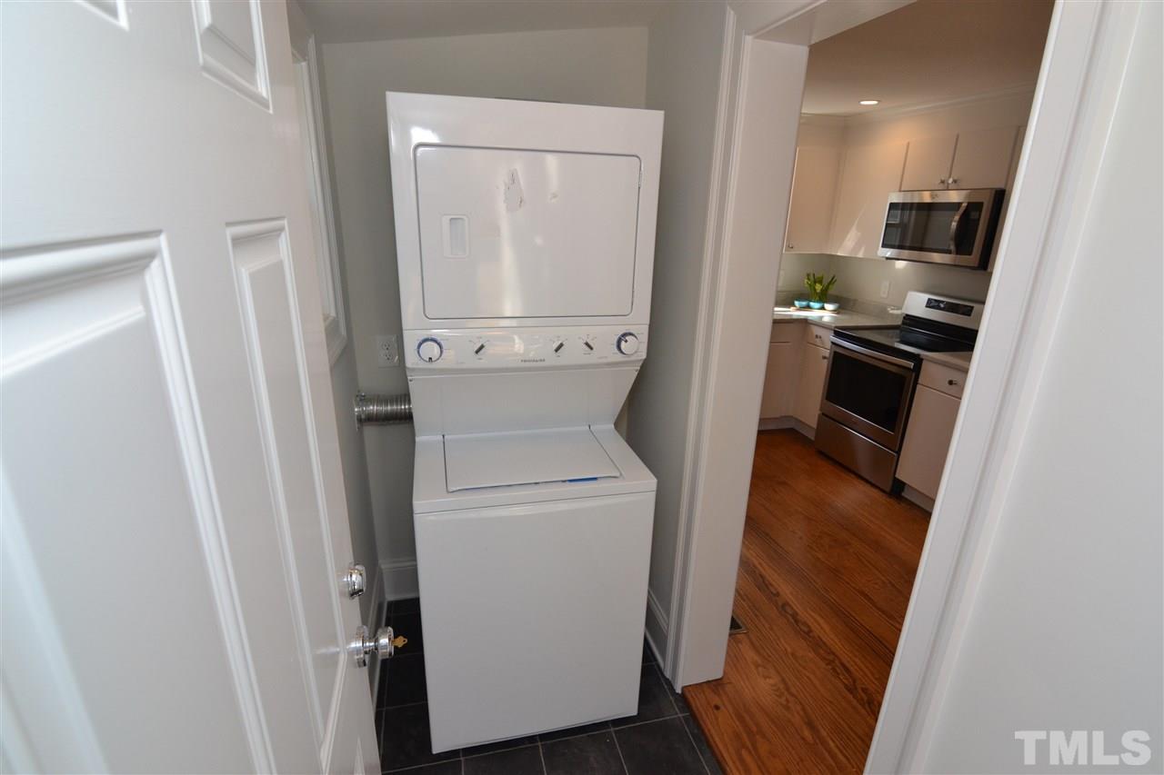 2403 Bedford Avenue Raleigh, NC 27607 - Photo 12 of 14 a hallway with washer and dryer