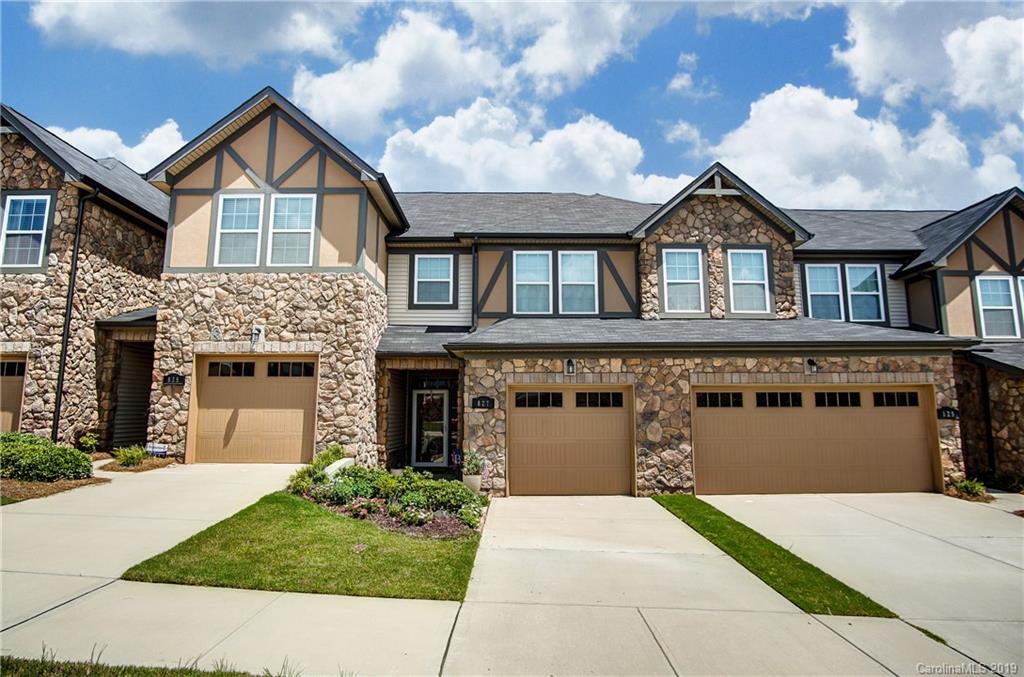 827 Ayrshire Avenue Fort Mill, SC 29708 - Photo 2 of 47 a front view of a house with a yard and garage