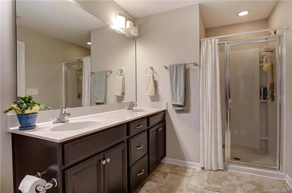 827 Ayrshire Avenue Fort Mill, SC 29708 - Photo 25 of 47 a bathroom with a double vanity sink mirror and shower