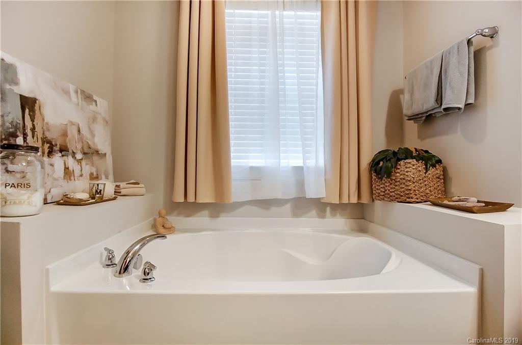 827 Ayrshire Avenue Fort Mill, SC 29708 - Photo 28 of 47 a bathroom with bathtub sink