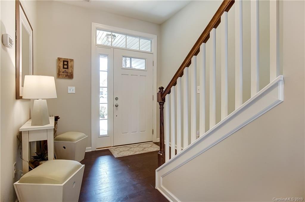 827 Ayrshire Avenue Fort Mill, SC 29708 - Photo 4 of 47 a view of a livingroom with wooden floor and furniture