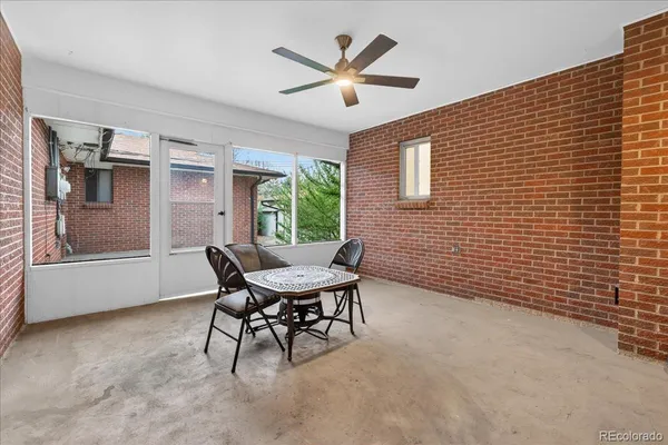 a view of a livingroom with furniture and window