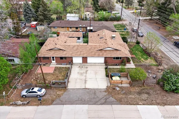 an aerial view of a house with garden