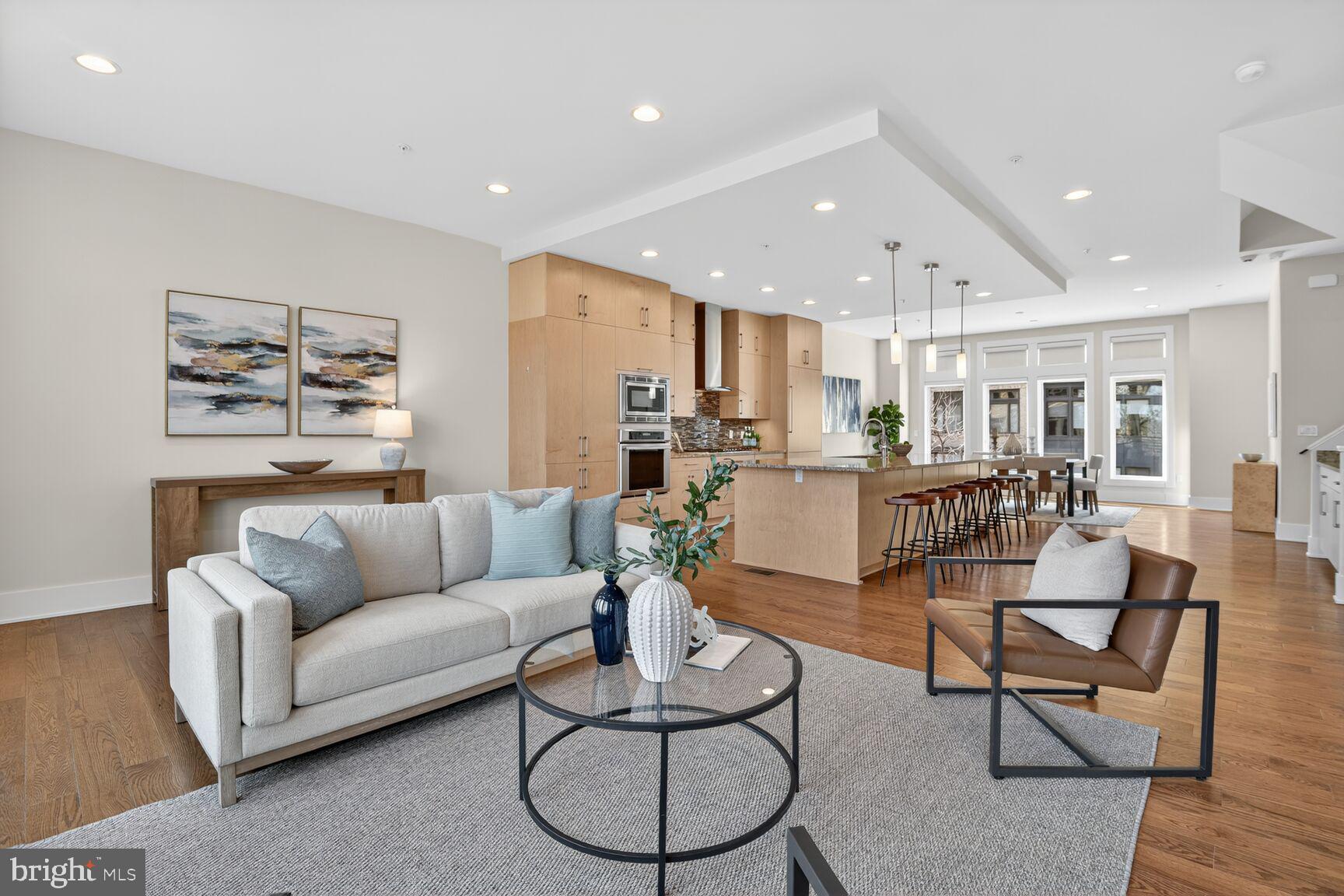 5320 Merriam Street Bethesda, MD 20814 - Photo 19 of 51 a living room with furniture kitchen view and a table