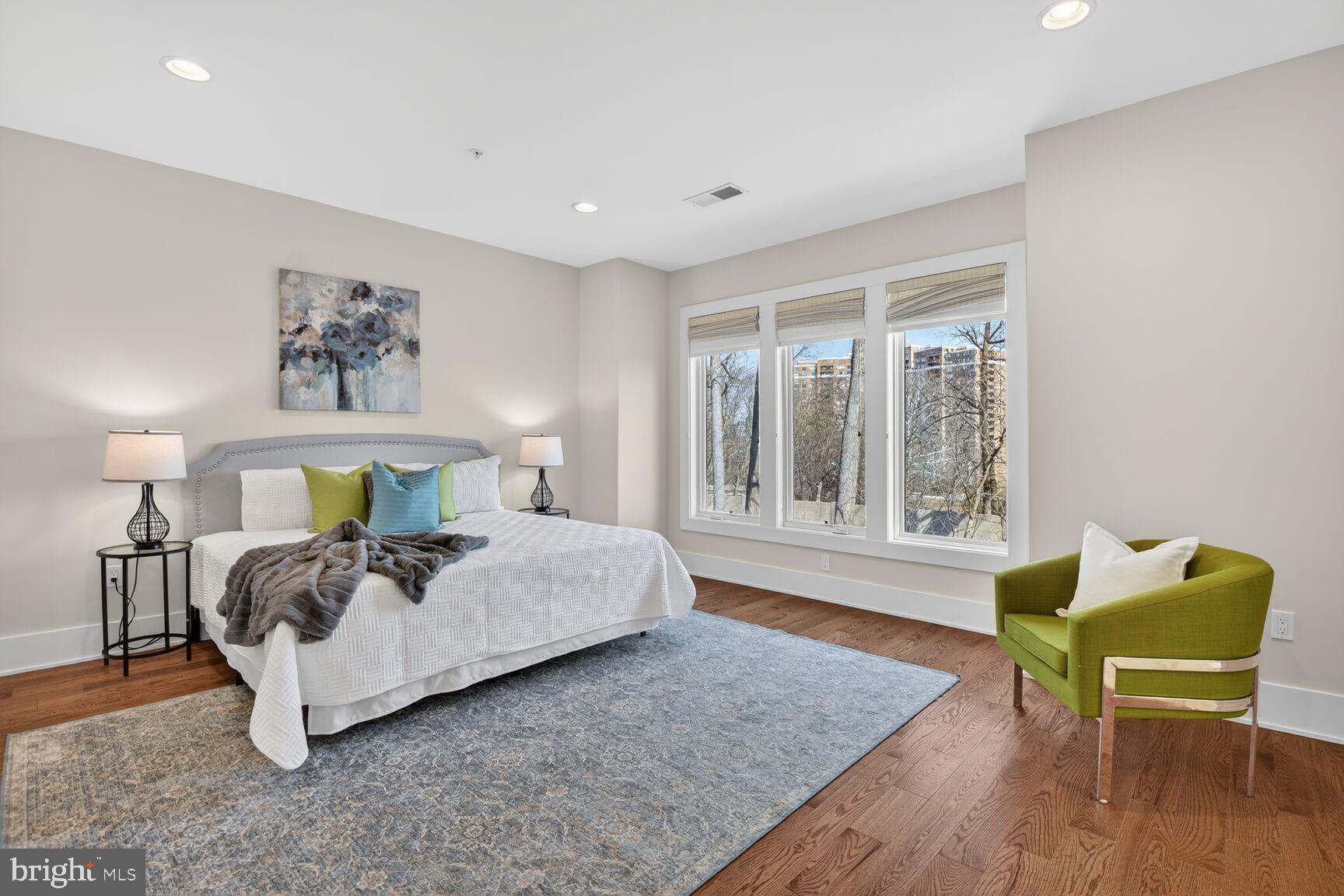 5320 Merriam Street Bethesda, MD 20814 - Photo 29 of 51 a bed room with a bed and a chair