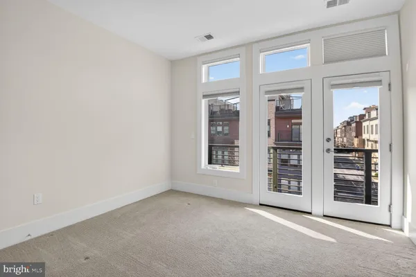 an empty room with windows