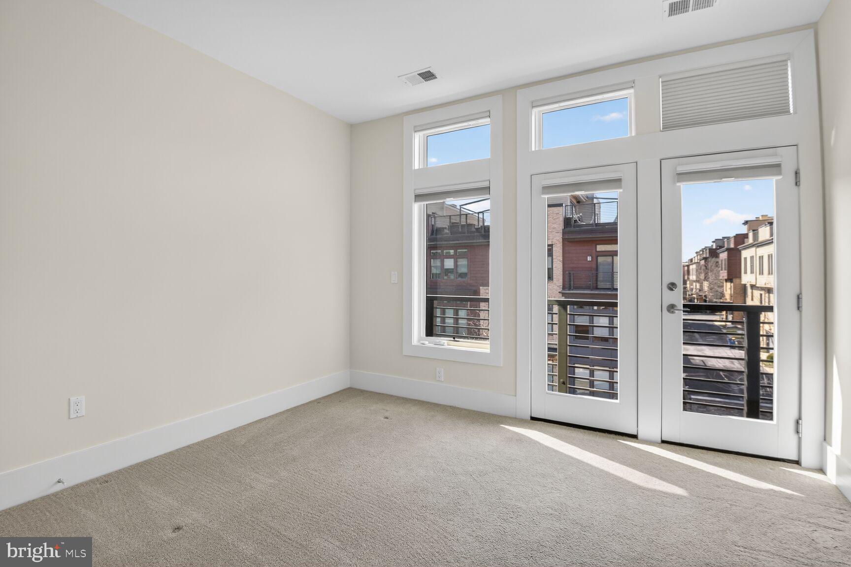 5320 Merriam Street Bethesda, MD 20814 - Photo 33 of 51 an empty room with windows