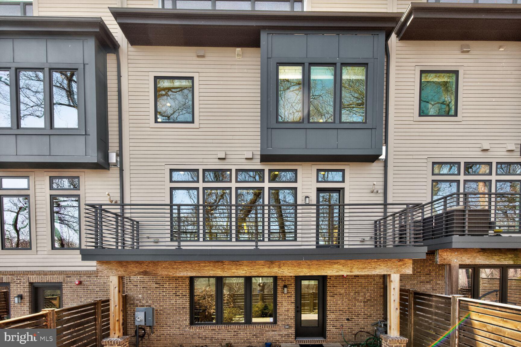 5320 Merriam Street Bethesda, MD 20814 - Photo 41 of 51 a view of a brick building with many windows