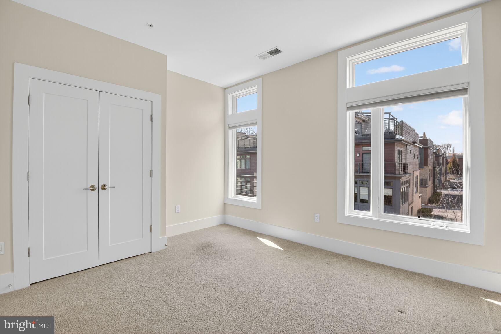 5320 Merriam Street Bethesda, MD 20814 - Photo 5 of 51 a view of an empty room with a window