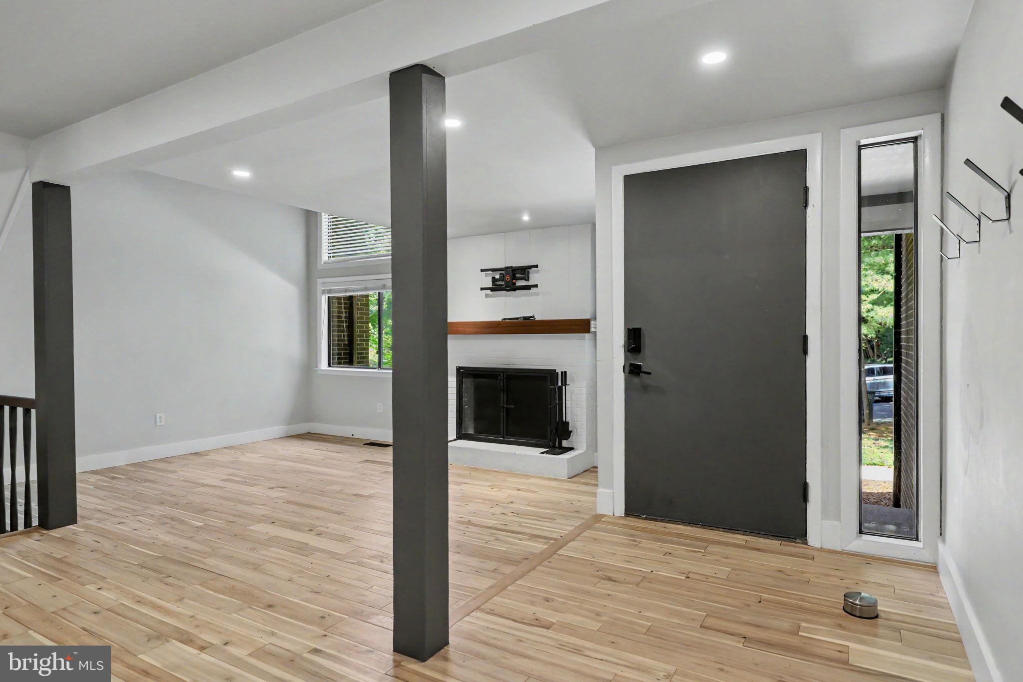 2105 Glencourse Lane Reston, VA 20191 - Photo 6 of 74 In hallway looking at front door