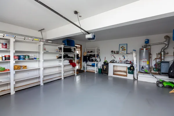 a room with furniture and white walls